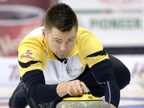 Manitoba skip Mike McEwen makes a shot during a draw against Newfoundland and Labrador at the Tim Hortons Brier in Ottawa on Saturday. (Justin Tang/Canadian Press)
