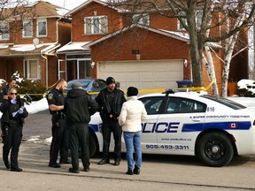 Peel Regional Police outside a home on Harrowsmith Dr. in Mississauga, in the Eglinton and Confederation area, Saturday, March 5, 2016 after a man was found stabbed. He later died in hospital. (Pascal Marchand/Special to the Toronto Sun)