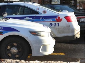 Ottawa police sit in front of the Shifa Restaurant in Ottawa Monday Feb 1, 2016. TONY CALDWELL / POSTMEDIA NETWORK