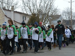 Supporters of the Petrolia Hockeyville campaign - many wearing Petrolia Oilers jerseys - marched in a parade through town on Saturday. The bid would ultimately be unsuccessful. (BRENT BOLES / THE TOPIC)