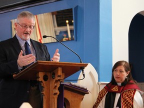 City economic development director Peter Hungerford addresses a crowd gathered for the annual mariners' service at St. Paul's Anglican Church in Point Edward Sunday. Every year St. Paul's hosts the inter-faith service before the start of the navigation season on the Great Lakes because of its historic marine roots. Pictured here Sunday with Hungerford is St. Paul's Rev. Kristen Oliver. (Barbara Simpson/Sarnia Observer/Postmedia Network)