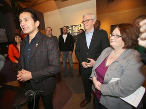 Wab Kinew speaks during his February announcement that he would seek the Fort Rouge NDP nomination. From the left; Wab Kinew, Premier Greg Selinger, and MLA Jennifer Howard. (Winnipeg Sun/Postmedia Network)