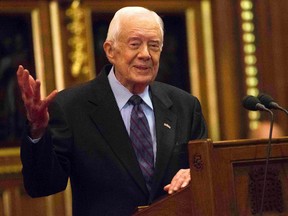 In a Wednesday, Feb. 3, 2016 file photo, former U.S. president Jimmy Carter delivers a lecture on the eradication of the Guinea worm, at the House of Lords in London. (Neil Hall/Pool Photo via AP, File)
