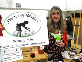 London Middlesex Master Gardener Nancy Abra, holds one of the jellies she made from ingredients grown in her garden. Abra, owner of From My Garden, was one of the vendors at Seedy Saturday.