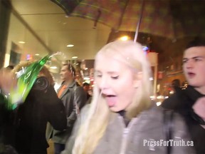 Rebel reporter Lauren Southern had a bottle of urine poured on her at a protest in Vancouver on Friday, March 4, 2016. (YouTube video screenshot)