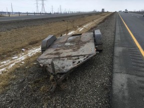 A Chatham-Kent OPP officer used his cruiser to block this flatbed from coming into the lanes of oncoming traffic on the Highway 401 near. (Police supplied photo)