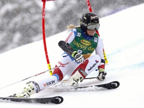 Switzerland's Lara Gut competes during an alpine ski World Cup women's giant slalom, in Jasna, Slovakia, Monday, March 7, 2016. (AP Photo/Alessandro Trovati)