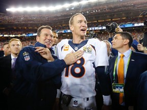 Denver Broncos' head coach Gary Kubiak (L) and quarterback Peyton Manning celebrate after their team defeated the Carolina Panthers in the NFL's Super Bowl 50 football game in Santa Clara, California in this February 7, 2016 file photo. Denver Broncos quarterback Peyton Manning has decided to retire from the NFL, bringing an end to a career that will surely land him in the Pro Football Hall of Fame, the team said on March 6, 2016.     REUTERS/Mike Blake/Files