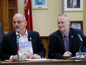 Emily Mountney-Lessard/The Intelligencer
Mayor Taso Christopher promotes the Belleville magazine  during operating budget discussions, on Monday in Belleville. At right is city clerk Matt MacDonald.