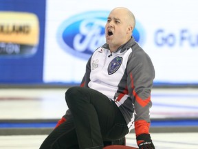 Skip Jamie Koe of Team Northwest Territories reacts after tying the game in the 10th end against Team Alberta during the Brier at TD Place in Ottawa on Monday, March 7, 2016. (Jean Levac/Postmedia Network)