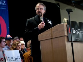 In a Saturday, March 5, 2016 photo, Coeur d'Alene pastor Tim Remington leads the prayer, during the rally for Republican presidential hopeful Ted Cruz at the Kootenai County Fairgrounds in Coeur d'Alene, Idaho. He was shot six times March 6 as he was leaving the Altar Church after Sunday services. (Kathy Plonka / The Spokesman-Review, via AP)