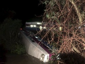 General view of a San Francisco Bay Area commuter train derailment at a creek in Niles Canyon in this handout released by the Alameda County Fire Department March 7, 2016. Fourteen people were hurt, four seriously, when a San Francisco Bay Area commuter train derailed and one of the train cars fell into a creek on Monday night, officials said. REUTERS/Alameda County Fire Department/Handout via Reuters