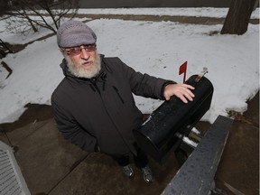Martin Amdur is photographed next to his mailbox in Windsor, Ont., on March 3, 2016. Amdur is upset that Canada Post has suspended delivery in the area due to roaming dogs. (TYLER BROWNBRIDGE/The Windsor Star/Postmedia Network)