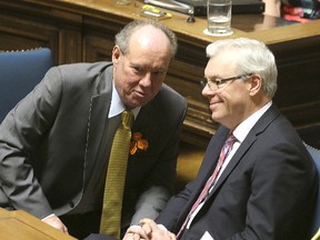 Finance Minister Greg Dewar (left) and Premier Greg Selinger will release a fiscal update on Tuesday. (Brian Donogh/Winnipeg Sun file photo)