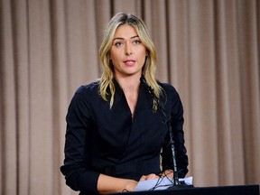 Maria Sharapova speaks to the media announcing a failed drug test after the Australian Open during a press conference today at The LA Hotel Downtown. Jayne Kamin-Oncea-USA TODAY Sports