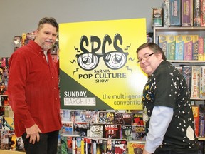 Trent Rogers and Terry Wardell, organizers of the fourth annual Sarnia Pop Culture Show, hold up the official sign of multi-genre convention inside Rogers' Future Pastimes store.
CARL HNATYSHYN/SARNIA THIS WEEK