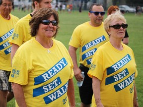 Breast cancer survivor Jayne Collier walks in the survivors' lap during the 2015 Relay For Life event in Sarnia. This year, Relay For Life will be held Friday, June 17 from 6 p.m. to 12 midnight at Clearwater Arena Park. (File photo/Sarnia Observer)