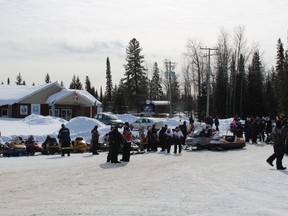 Snowmobilers from all across the province participated in the annual run to help raise funds for the Lady Minto Hospital's Chemotherapy Room. Machines of various ages filled the parking lot at the Polar Bear Habitat/ Cochrane Classic Vintage Riders Club & Museum.