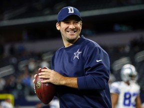 Dallas Cowboys quarterback Tony Romo warms up for the team's NFL football game against the New York Jets on Saturday, Dec. 19, 2015, in Arlington, Texas. (AP Photo/Brandon Wade)