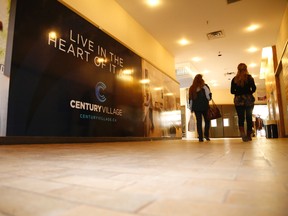 Jason Miller/The Intelligencer
Two women talk as they walk along the corridors at Century Place tagged for condominiums on three of five floors. The developers of Century Village say they're on the cusp of starting to build 38 units at the downtown condominium development.