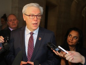 Manitoba Premier Greg Selinger speaks to the media after the Conservatives attempted to block the reading of the NDP's financial update in the Legislature in Winnipeg, Man. Tuesday March 08, 2016.
Brian Donogh/Winnipeg Sun/Postmedia Network