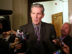 Manitoba Conservative leader Brian Pallister speaks to the media after attempting to block the reading of the NDP's financial update in the Legislature in Winnipeg, Man. Tuesday March 08, 2016.
Brian Donogh/Winnipeg Sun/Postmedia Network