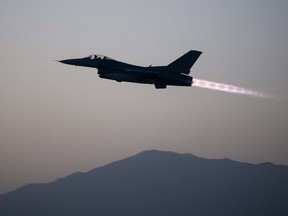 File photo of a U.S. Air Force F-16 Fighting Falcon aircraft assigned to the 555th Expeditionary Fighter Squadron takes off on a combat sortie from Bagram Air Field, Afghanistan, on September 6, 2015. The F-16 is a multi-role fighter aircraft that is highly maneuverable and has proven itself in air-to-air and air-to-ground combat. AFP PHOTO / HANDOUT US AIR FORCE / TECH. SGT. JOSEPH SWAFFORD