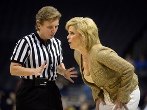 Oklahoma City, OK, USA; Baylor Bears head coach Kim Mulkey speaks to an official about a call in action against the Texas Longhorns in the first quarter during the women's Big 12 conference tournament at Chesapeake Energy Arena. (Mark D. Smith-USA TODAY Sports)