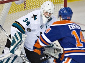 San Jose Sharks goalie James Reimer makes the save on Edmonton Oilers forward Jordan Eberle on the way to a 3-0 shutout over Edmonton at Rexall Place on Tuesday. (Jason Franson)