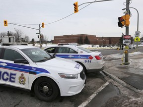 Ottawa Police investigate the city's 5th homicide of 2016 at the corner of Jasmine Crescent and Ogilvie Road in Ottawa Wednesday March 9, 2016. Nooredin Hassan, a 20-year-old man has been identified as the man shot dead Tuesday.   Tony Caldwell