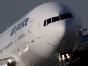 An Air France Boeing 777 aircraft lands at the Charles de Gaulle International Airport in Roissy, near Paris, France in this Oct. 27, 2015 file photo.    REUTERS/Christian Hartmann/Files