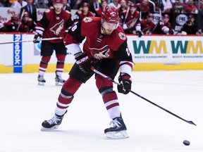 Arizona Coyotes defenseman Jarred Tinordi (28) shoots the puck during the second period against the Montreal Canadiens at Gila River Arena. Matt Kartozian-USA TODAY Sports