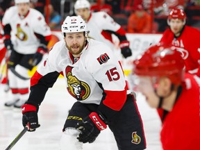 Ottawa Senators forward Zach Smith (15) watches the play against the Carolina Hurricanes at PNC Arena. The Carolina Hurricanes defeated the Ottawa Senators 4-3. James Guillory-USA TODAY Sports