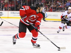 New Jersey Devils left winger Tuomo Ruutu skates with the puck during second-period NHL action against the Ottawa Senators at Prudential Center on Jan. 21, 2016. (Ed Mulholland/USA TODAY Sports)