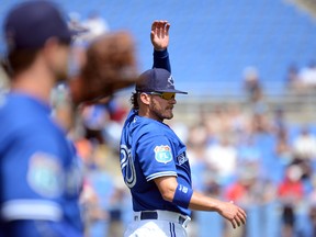 Toronto Blue Jays infielder Josh Donaldson warms up before the start of the spring training game against the Minnesota Twins at Florida Auto Exchange Park in Dunedin, Fla., on March 8, 2016. (Jonathan Dyer/USA TODAY Sports)