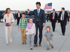 Prime Minister Justin Trudeau arrives for a state visit with his wife Sophie Gregoire-Trudeau, left, and their children Xavier James, Ella-Grace and Hadrian, right, at Andrews Air Force Base, Md., Wednesday, March 9, 2016. THE CANADIAN PRESS/Paul Chiasson