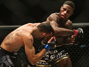 Tristan Johnson (left) fights Hakeem Dawodu (right) during World Series of Fighting 18 at the Edmonton Expo Centre in Edmonton on Feb. 12, 2015. (Codie McLachlan/Postmedia Network/Files)