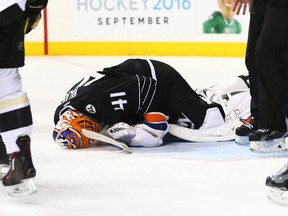 New York Islanders goaltender Jaroslav Halak lays on the ice after being injured late in the third period against the Pittsburgh Penguins at Barclays Center in Brooklyn on March 8, 2016. (Andy Marlin/USA TODAY Sports)