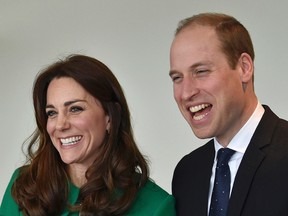 Britain's Prince William and his wife Catherine, Duchess of Cambridge, laugh during their visit to St Thomas' Hospital in London, Britain March 10, 2016.    REUTERS/Toby Melville