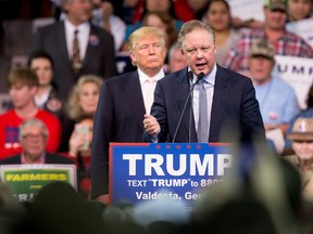 In this Feb. 29, 2016 file photo, NASCAR Chairman and CEO Brian France, right, speaks at a rally for Republican presidential candidate Donald Trump at Valdosta State University in Valdosta, Ga. France’s decision to personally endorse GOP front-runner Donald Trump has roiled a sport his family built from the ground up, threatening to undo a decade of work to broaden the its appeal among minorities and risking a break with the corporate sponsors that are its financial lifeblood. (AP Photo/Andrew Harnik, File)