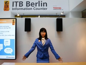 Communication android 'Chihira Kanae' gives out advice at an information counter at the International Tourism Trade Fair (ITB) in Berlin, Germany, March 9, 2016. 'Chihira Kanae', which was created by Toshiba, has her own information counter where she welcomes visitors through two way communication, provides information on the trade fair and answers any questions visitors may have in English, German, Japanese and Chinese. REUTERS/Fabrizio Bensch