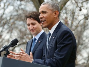 U.S. President Barack Obama (R) and Canadian Prime Minister Justin Trudeau hold a joint news conference in the White House Rose Garden in Washington March 10, 2016.  REUTERS/Kevin Lamarque