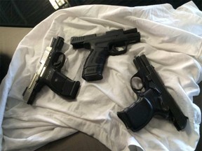 These guns were seized by police as part of Project Kirby. (Handout)