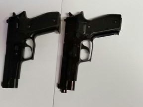 A Woodstock teen brought a BB gun to a local high school and shot a 15-year-old several times on Tuesday morning. The victim thought the gun was real. Woodstock Police released this photo showing a handgun (left) beside the BB gun (right). (Submitted)