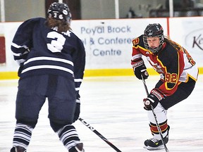 Belleville native Leigh Shilton of the Guelph Gryphons moves the puck against U of T in an OUA women's varsity hockey game this season. (Joe D'Angelo photo)