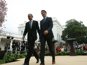 U.S. President Barack Obama, left, and Canadian Prime Minister Justin Trudeau depart after a joint news conference in the White House Rose Garden in Washington, on March 10, 2016. (REUTERS/Kevin Lamarque)