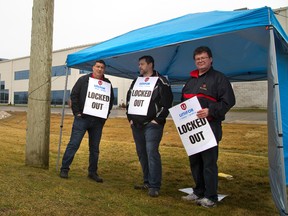 Edgardo Martinez, Jamie Douglas and Peter Hertlein who work for Accucaps Strathroy are locked out on Thursday March 10, 2016. About 160 unionized workers say they were locked out after negotiations stalled. The plant manufactures gel caps for pharmaceuticals and vitamins. (MIKE HENSEN, The London Free Press)