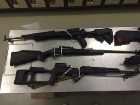 Firearms seized during a search warrant execution that uncovered a marijuana grow operation in a residence near 96 Street and 111 Avenue on Tuesday, March 2, 2016.