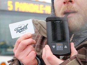 Jason Miller/Intelligencer file photo
Christopher Hobin, pictured here in front the number five bus, shows his medical marijuana card and vaporizing device at the transit terminal.