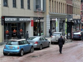 Sparks Street businesses are handing out free parking passes to their customers. TONY CALDWELL / POSTMEDIA NETWORK